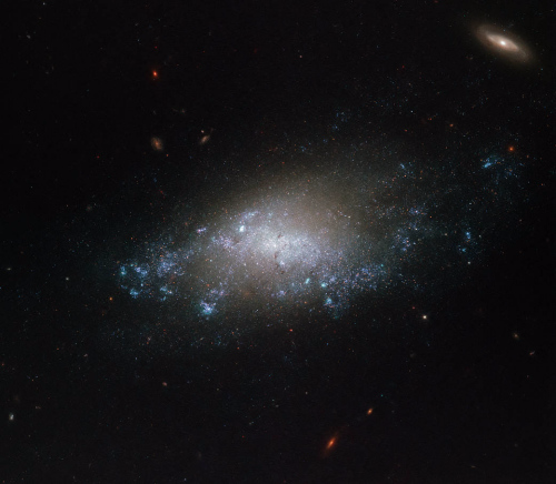 遥远的微光:哈勃望远镜拍摄狮子座螺旋星系-影像中心-浙江在线