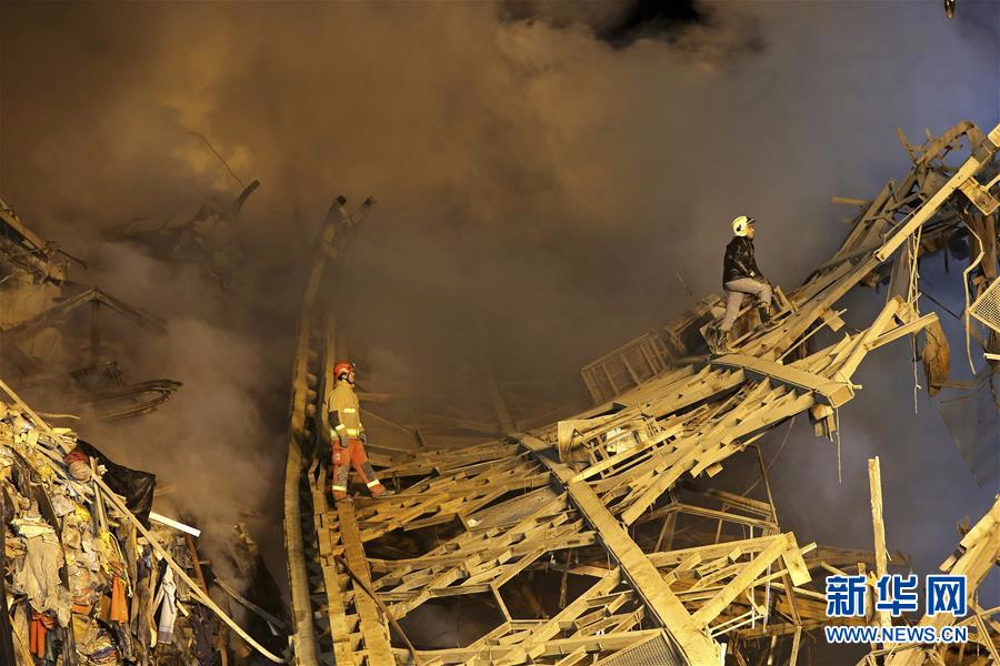（外代一线）（5）伊朗一高层商厦起火倒塌致至少20名消防员丧生